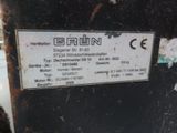 a sign on the side of a machine that says grun