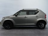 a picture of a silver suv parked in a garage