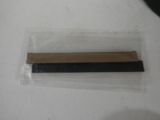 a piece of wood in a plastic bag on a table