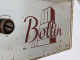 a close up of a sign on the side of a building