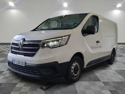 the white van is parked on a checkered floor in a room