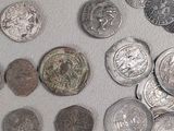 a lot of coins that are on the table