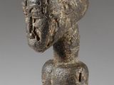 an image of a statue of a woman with a hat on her head