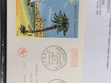 a picture of an envelope with a picture of a palm tree