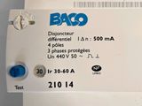 a label on the back of a machine that says baq