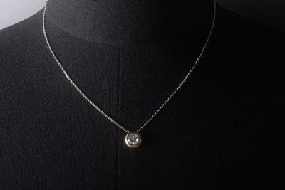 a close up of a necklace on a mannequin mannequin mannequin mannequin mannequin mannequin mannequin mannequin