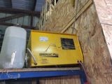 a yellow box sitting on top of a shelf in a building