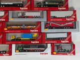 many different types of toy trucks in the box