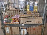 a large metal cage filled with lots of food