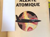 an open book with a picture of an airplane on it