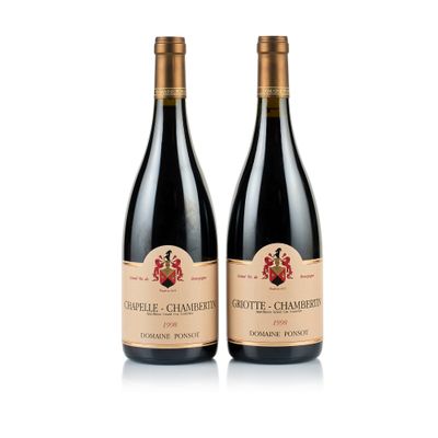 two bottles of wine sitting next to each other on a white surface