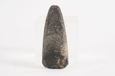 an image of a stone object on a white surface