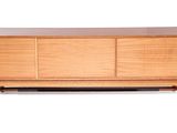the sideboard is made of wood and has a glass top