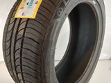 a close up of a tire on a white surface