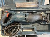 a tool in the case that is sitting on the floor