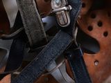 a close up of a helmet with a strap on it