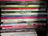 a lot of books in a box on the table