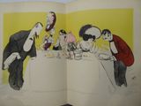 illustration of an open book with a drawing of a family having a meal