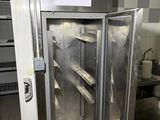 an image of a stainless steel refrigerator in a kitchen