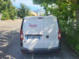 a van that is parked on the side of the road