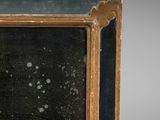 an old wooden box with a black and white picture inside of it
