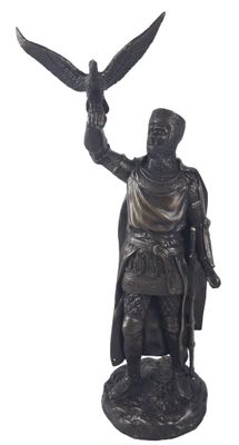 bronze statue of a man holding a bird and a bird in his hand