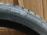 a close up of a bicycle tire with a box in the background