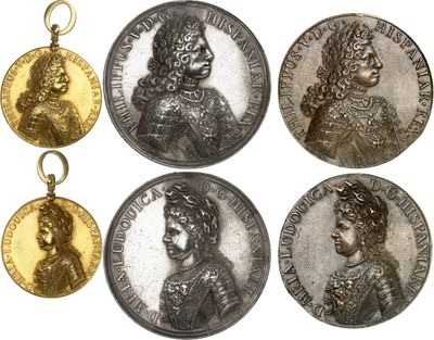 four silver and gold medallions with portraits of women on them