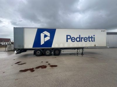 a semi truck that is parked in a parking lot