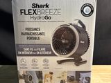 the box of the shark flex breezer is open on the table