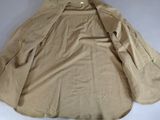 the jacket is tan and has buttons on the collar