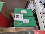 many boxes on the shelf in the store