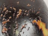 a close up of a vase with a black and orange decoration
