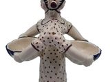 a figurine of a rabbit with a dress on
