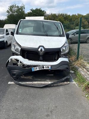 a white van that is parked in a parking lot