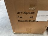 a cardboard box that is sitting on the ground