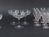 a lot of empty wine glasses on the table