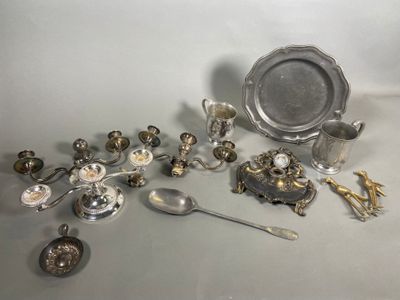 a lot of silver items that are on the table