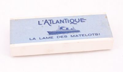 une image représentant une carte de briquet sur laquelle figure un bateau