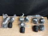 several different types of camera lenses sitting on top of a wooden table