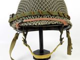 an image of a helmet on a stand on a white background
