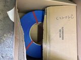 a box with a roll of tape and a roll of tape in it