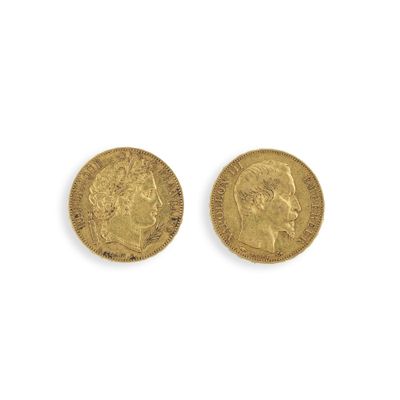 two gold sovereigns, one of which has a head of a man and the other of a woman