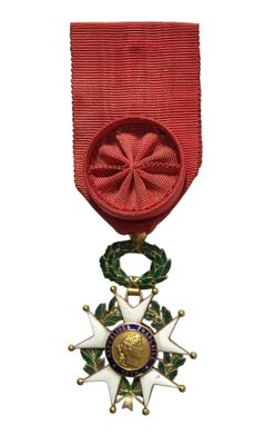 l'image d'une médaille surmontée d'une étoile