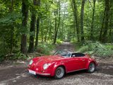 a red car parked in the middle of a forest