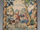 une tapisserie représentant un homme à cheval près d'un arbre