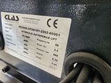 a label on the back of a machine that is sitting on a table