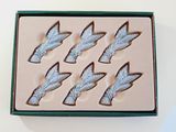 a box that has a bunch of small birds in it