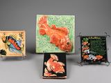 four different pieces of art are displayed on a gray surface