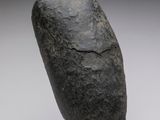 a close up of a sculpture of a rock on a stand
